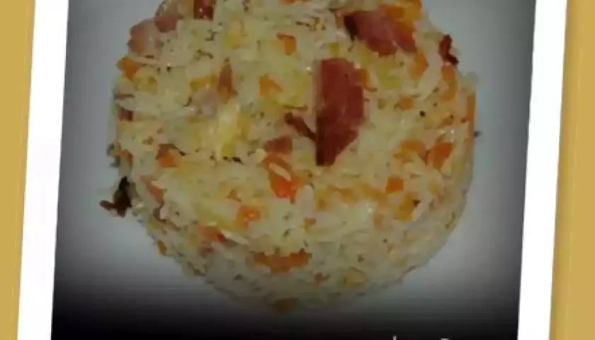 Delicioso arroz Nelba preparado en Thermomix, con trocitos de jamón y zanahoria. ¡Un plato completo y sabroso!