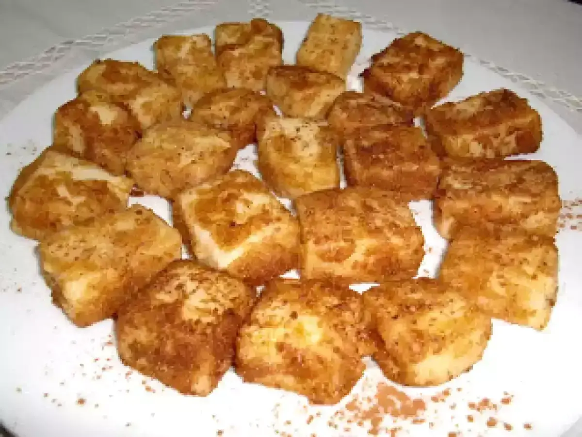 Deliciosa leche frita Thermomix, dorada y espolvoreada con canela, lista para disfrutar.